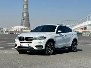 BMW  X-Series  X6  2016  Automatic  90,000 Km  8 Cylinder  Four Wheel Drive (4WD)  SUV  White  With Warranty