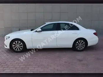 Mercedes-Benz  E-Class  200  2019  Automatic  80,000 Km  4 Cylinder  Rear Wheel Drive (RWD)  Sedan  White