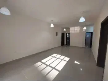 3 Bedrooms  Apartment  For Rent  in Doha -  Madinat Khalifa South  Not Furnished