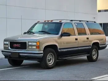  GMC  Suburban  1999  Automatic  62,000 Km  8 Cylinder  Four Wheel Drive (4WD)  SUV  Gold  With Warranty