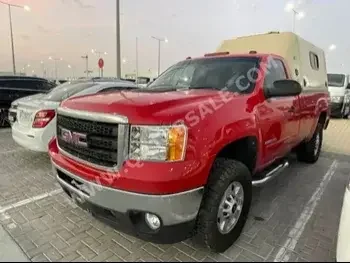 GMC  Sierra  2500 HD  2011  Automatic  260,000 Km  8 Cylinder  Four Wheel Drive (4WD)  Pick Up  Red