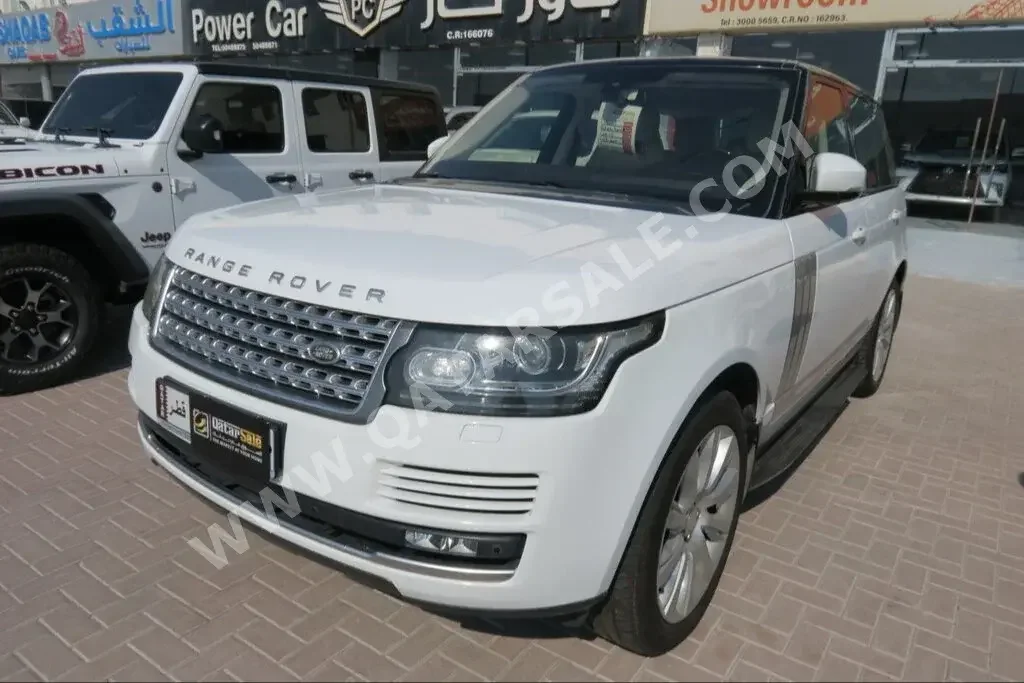 Land Rover  Range Rover  Vogue  2015  Automatic  112,000 Km  8 Cylinder  Four Wheel Drive (4WD)  SUV  White