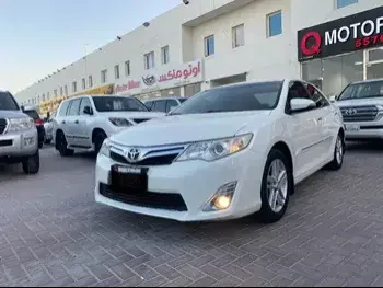 Toyota  Camry  GLX  2014  Automatic  106,000 Km  4 Cylinder  Front Wheel Drive (FWD)  Sedan  White