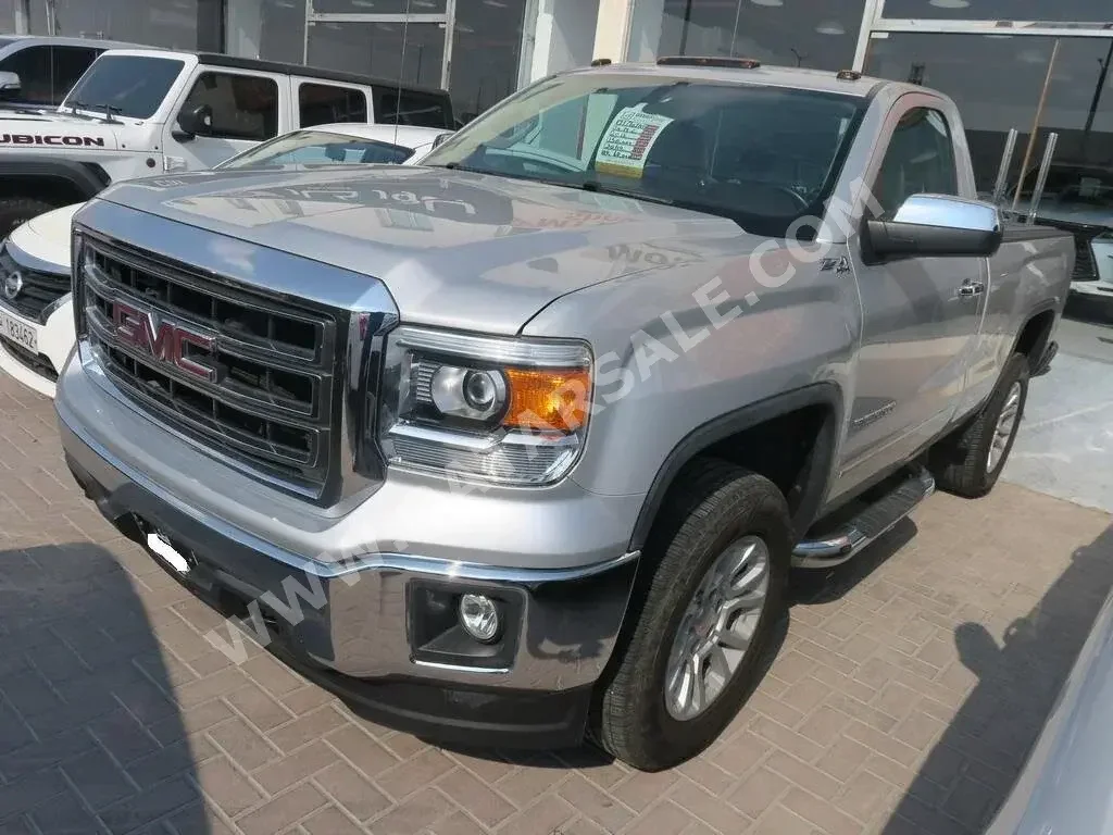 GMC  Sierra  SLE  2015  Automatic  150,000 Km  8 Cylinder  Four Wheel Drive (4WD)  Pick Up  Silver
