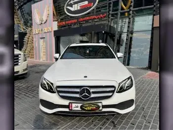 Mercedes-Benz  E-Class  200  2019  Automatic  88,000 Km  4 Cylinder  Rear Wheel Drive (RWD)  Sedan  White
