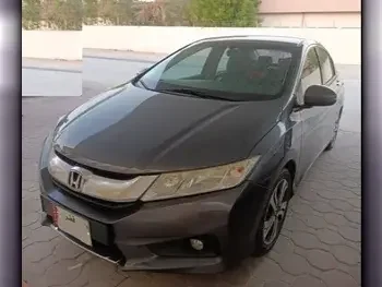 Honda  City  2014  Automatic  194,000 Km  4 Cylinder  Front Wheel Drive (FWD)  Sedan  Gray