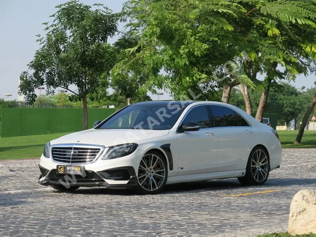 Mercedes-Benz  S-Class  63 AMG  2014  Automatic  31,000 Km  8 Cylinder  Rear Wheel Drive (RWD)  Sedan  White