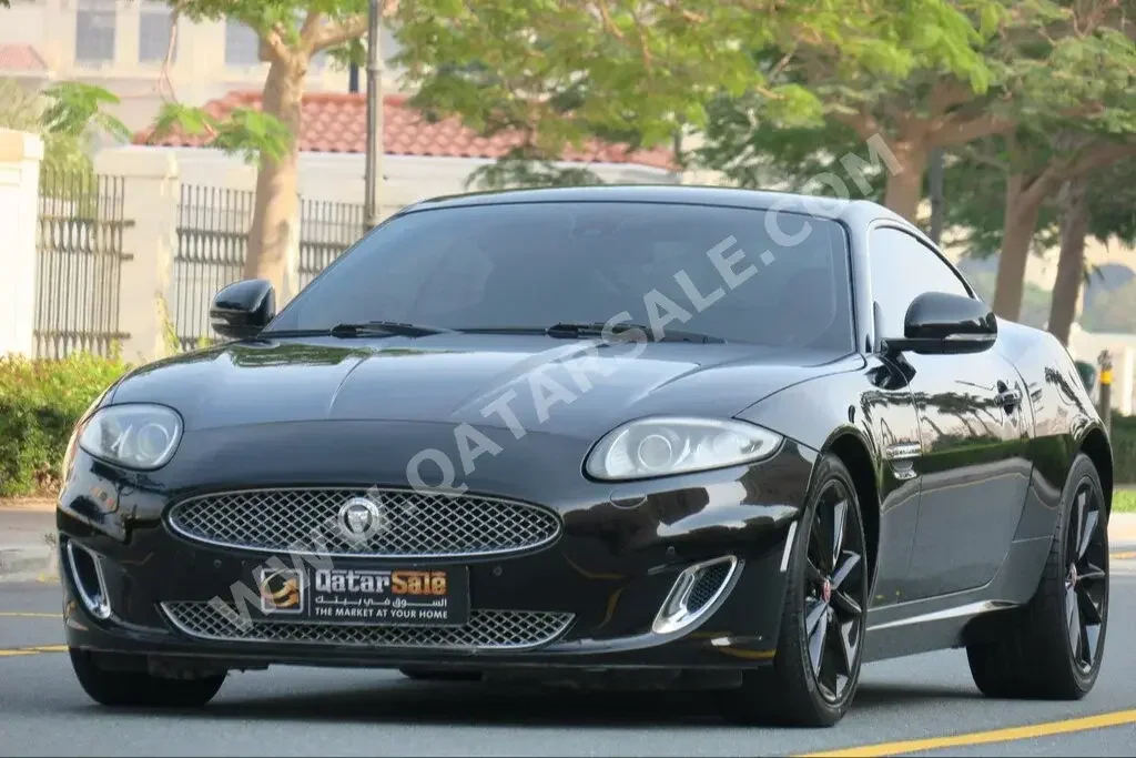 Jaguar  XK  2013  Automatic  54,000 Km  8 Cylinder  Rear Wheel Drive (RWD)  Coupe / Sport  Black