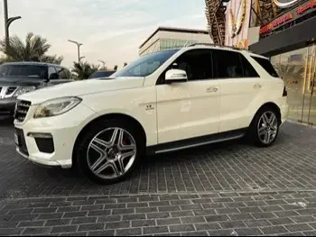 Mercedes-Benz  ML  63 AMG  2014  Automatic  127,000 Km  8 Cylinder  Four Wheel Drive (4WD)  SUV  White
