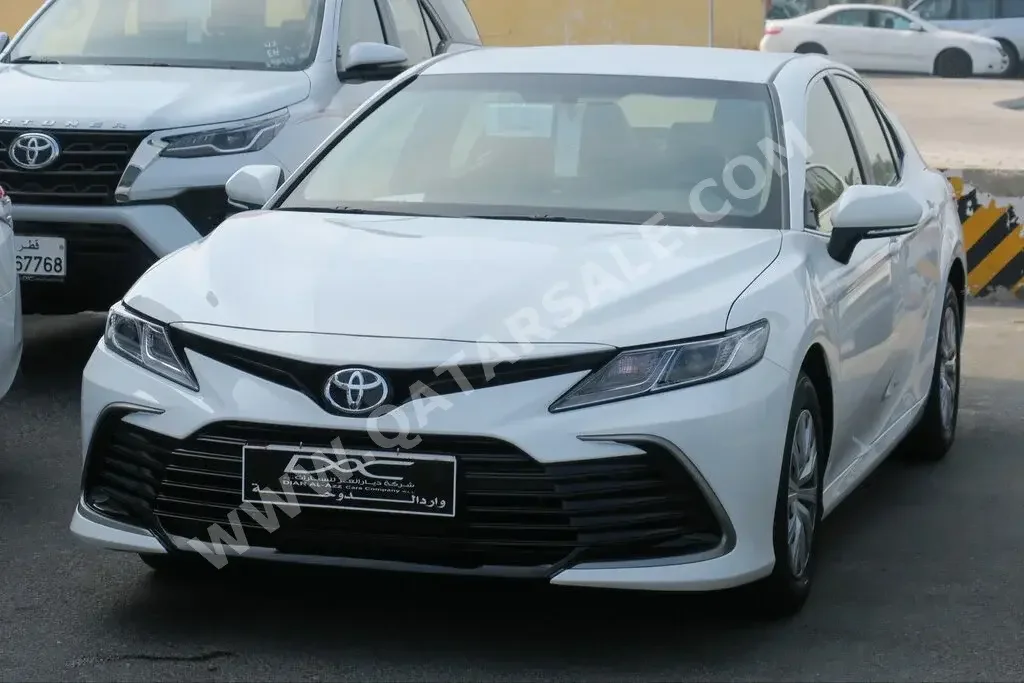 Toyota  Camry  LE  2024  Automatic  0 Km  4 Cylinder  Front Wheel Drive (FWD)  Sedan  White  With Warranty