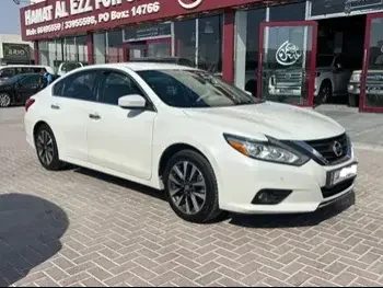 Nissan  Altima  2.5 S  2017  Automatic  123,000 Km  4 Cylinder  Front Wheel Drive (FWD)  Sedan  White