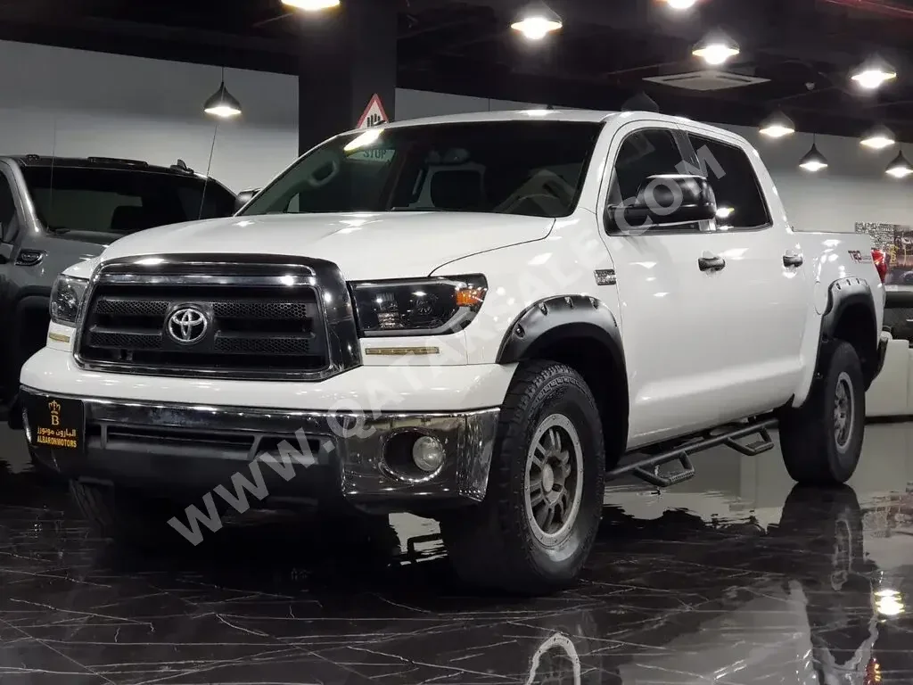 Toyota  Tundra  Rock Warrior  2012  Automatic  64,000 Km  8 Cylinder  Four Wheel Drive (4WD)  Pick Up  White