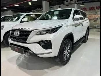 Toyota  Fortuner  2024  Automatic  0 Km  4 Cylinder  Four Wheel Drive (4WD)  SUV  White  With Warranty