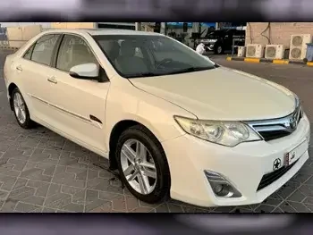 Toyota  Camry  GLX  2014  Automatic  129,000 Km  4 Cylinder  Front Wheel Drive (FWD)  Sedan  White