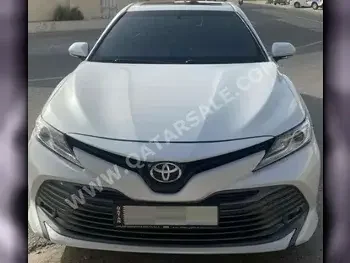 Toyota  Camry  Limited  2019  Automatic  63,000 Km  6 Cylinder  Front Wheel Drive (FWD)  Sedan  White