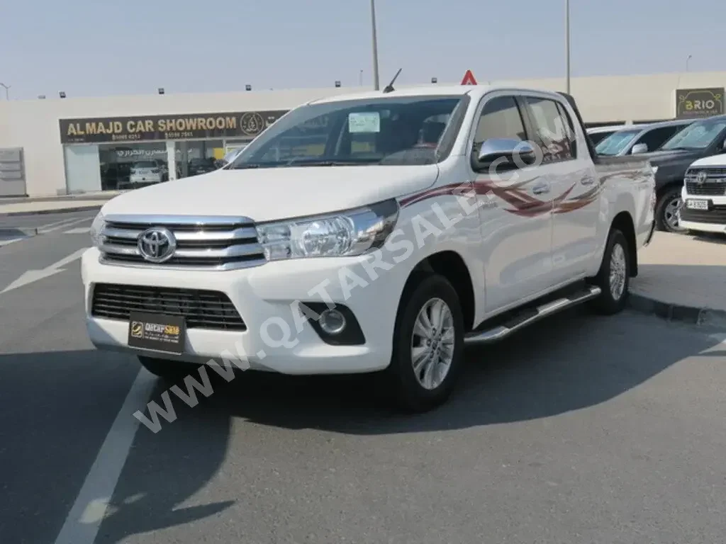 Toyota  Hilux  SR5  2022  Automatic  20,000 Km  4 Cylinder  Rear Wheel Drive (RWD)  Pick Up  White  With Warranty
