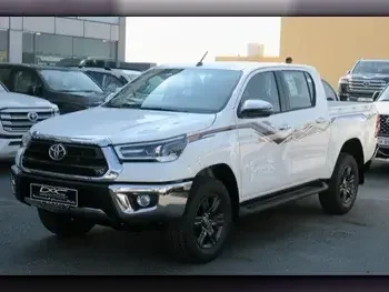 Toyota  Hilux  2024  Automatic  0 Km  4 Cylinder  Four Wheel Drive (4WD)  Pick Up  White  With Warranty