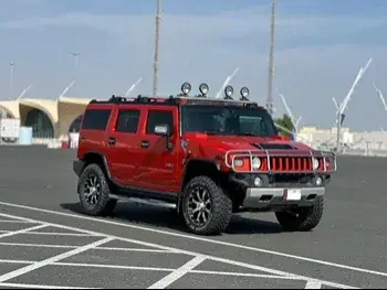Hummer  H2  2009  Automatic  124,000 Km  8 Cylinder  Four Wheel Drive (4WD)  SUV  Red