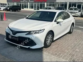 Toyota  Camry  LE  2020  Automatic  31,000 Km  4 Cylinder  Front Wheel Drive (FWD)  Sedan  White