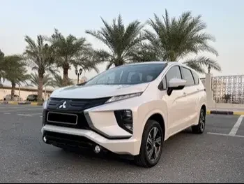 Mitsubishi  Xpander  2022  Automatic  57,600 Km  4 Cylinder  Front Wheel Drive (FWD)  SUV  White  With Warranty