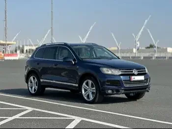 Volkswagen  Touareg  R line  2014  Automatic  121,000 Km  8 Cylinder  All Wheel Drive (AWD)  SUV  Blue