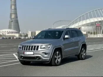 Jeep  Grand Cherokee  2014  Automatic  61,000 Km  6 Cylinder  Four Wheel Drive (4WD)  SUV  Silver