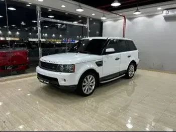 Land Rover  Range Rover  Sport HST  2011  Automatic  138,000 Km  8 Cylinder  Four Wheel Drive (4WD)  SUV  White
