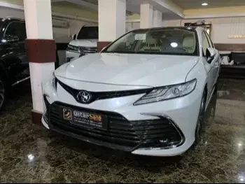 Toyota  Camry  Limited  2024  Automatic  0 Km  6 Cylinder  Front Wheel Drive (FWD)  Sedan  White  With Warranty