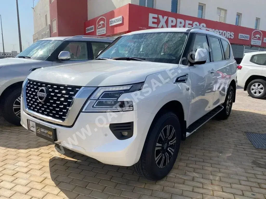 Nissan  Patrol  LE  2023  Automatic  0 Km  8 Cylinder  Four Wheel Drive (4WD)  SUV  White  With Warranty