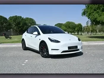 Tesla  Model Y  Performance  2023  Automatic  18,000 Km  0 Cylinder  All Wheel Drive (AWD)  Coupe / Sport  White  With Warranty
