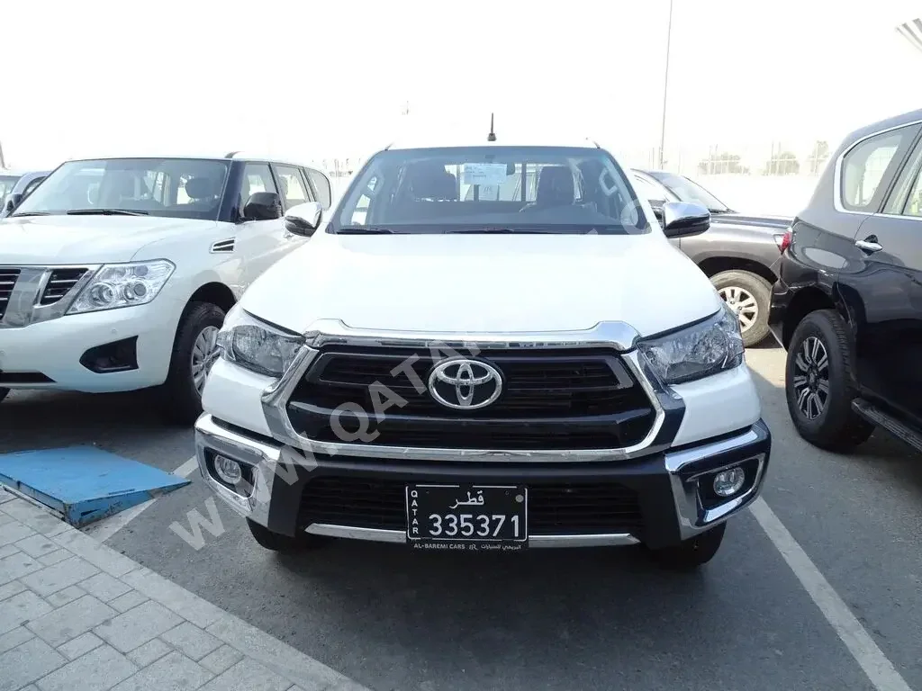  Toyota  Hilux  SR5  2024  Automatic  0 Km  4 Cylinder  Four Wheel Drive (4WD)  Pick Up  White  With Warranty