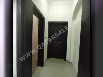 2 Bedrooms  Apartment  For Rent  in Al Khor -  Al Khor  Semi Furnished