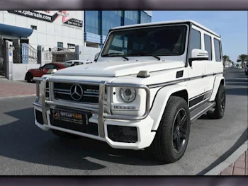Mercedes-Benz  G-Class  55 AMG  2005  Automatic  189,000 Km  8 Cylinder  Four Wheel Drive (4WD)  SUV  White