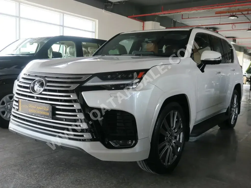 Lexus  LX  600 VIP  2022  Automatic  26,000 Km  6 Cylinder  Four Wheel Drive (4WD)  SUV  White  With Warranty