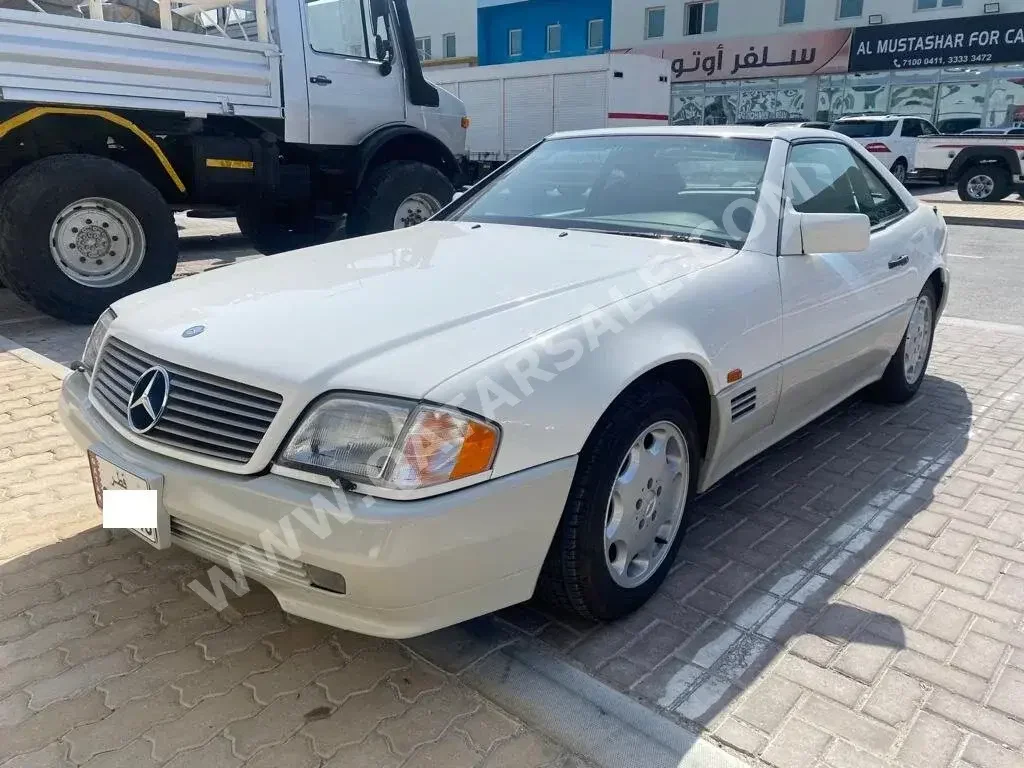 Mercedes-Benz  SL  500  1994  Automatic  125,000 Km  8 Cylinder  Rear Wheel Drive (RWD)  Coupe / Sport  White