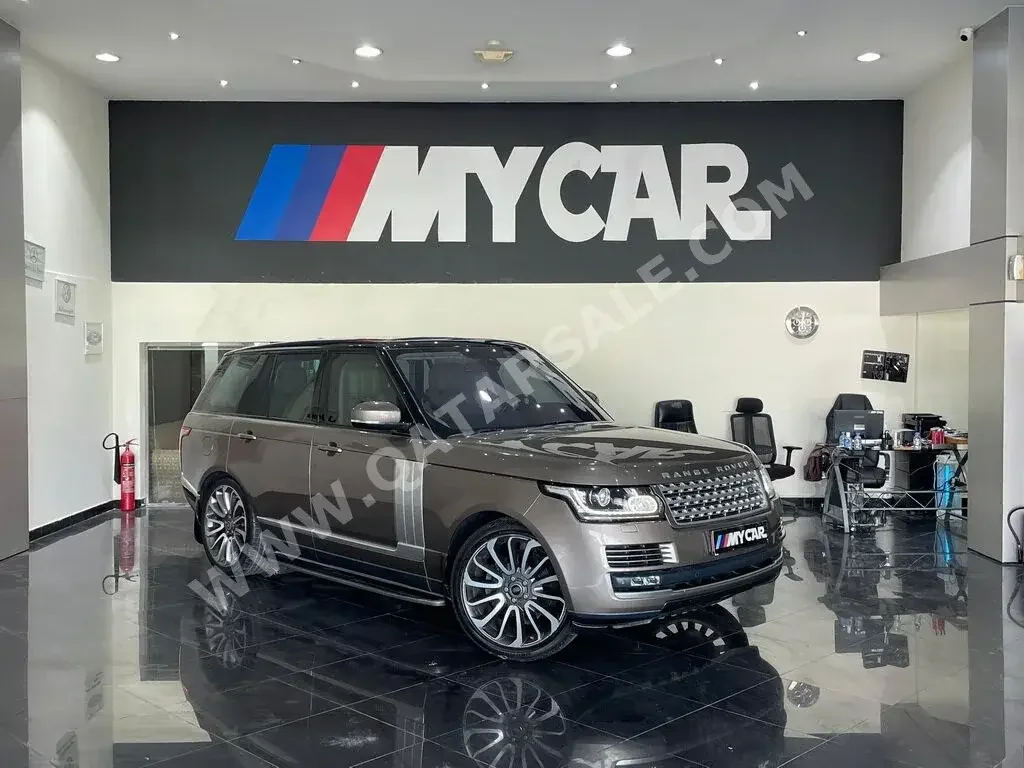 Land Rover  Range Rover  Vogue  2016  Automatic  64,000 Km  8 Cylinder  Four Wheel Drive (4WD)  SUV  Bronze