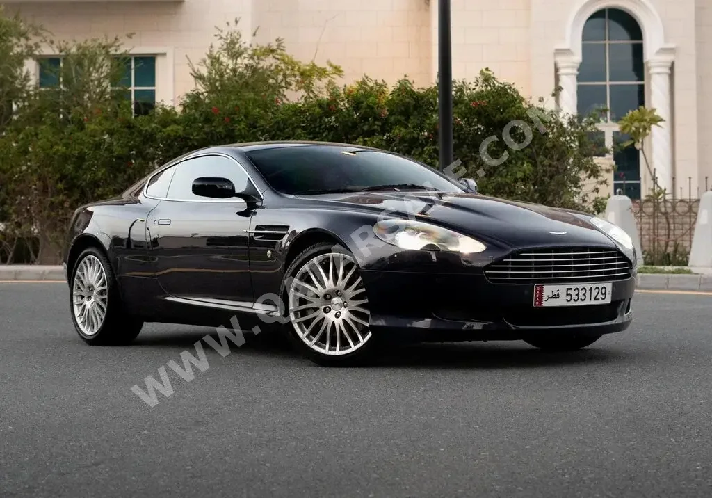 Aston Martin  DB  9  2010  Automatic  30,000 Km  8 Cylinder  Rear Wheel Drive (RWD)  Coupe / Sport  Black