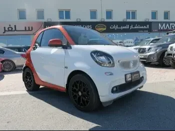  Smart  ForTwo  2015  Automatic  35,000 Km  4 Cylinder  Front Wheel Drive (FWD)  Hatchback  White  With Warranty