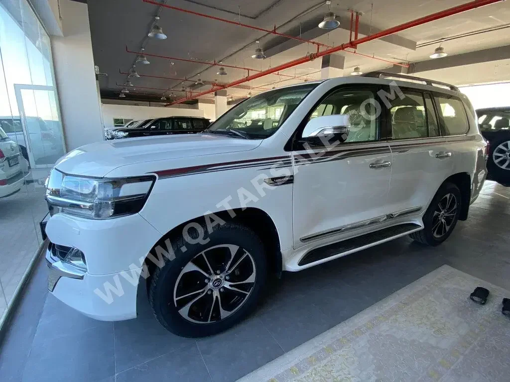 Toyota  Land Cruiser  GXR- Grand Touring  2021  Automatic  0 Km  6 Cylinder  Four Wheel Drive (4WD)  SUV  White  With Warranty