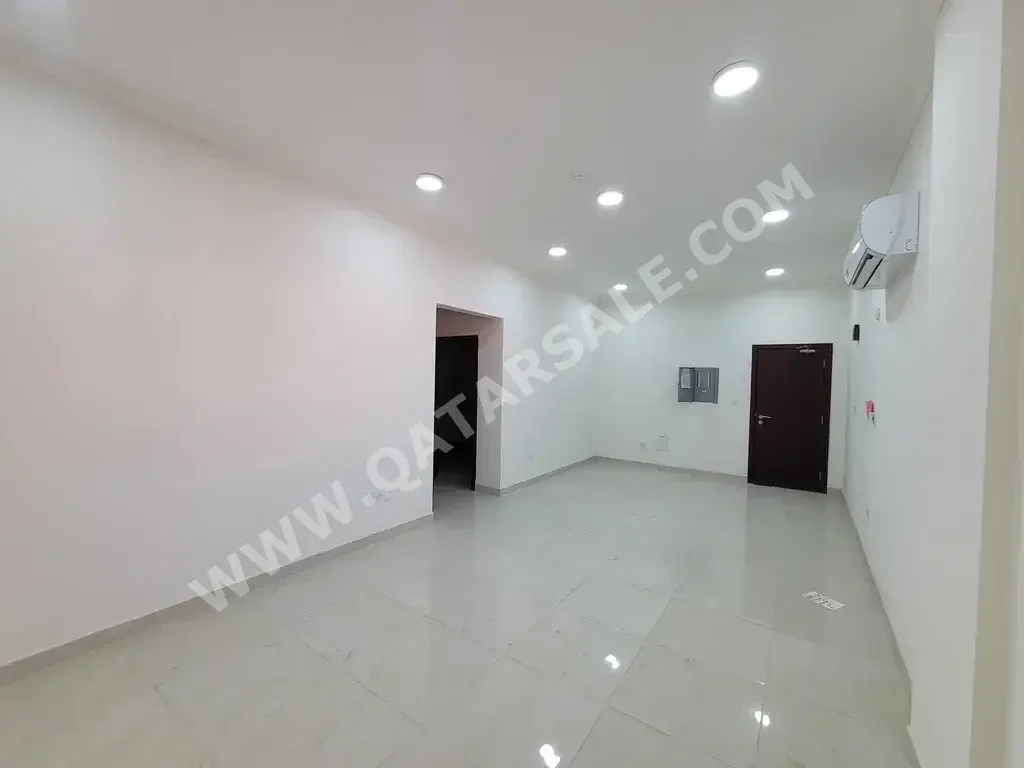 2 Bedrooms  Apartment  For Rent  in Umm Salal -  Al Kharaitiyat  Not Furnished