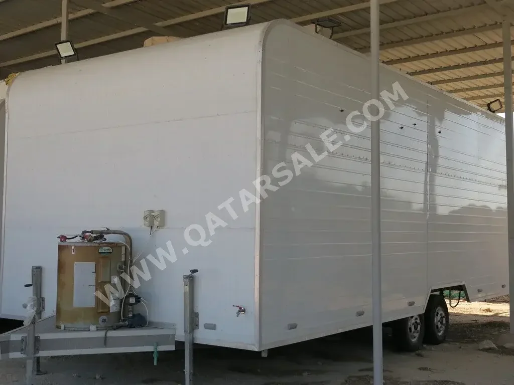 Caravan - 2022  - White  -Made in Qatar