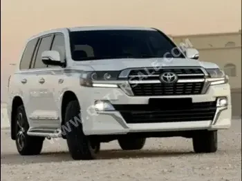 Toyota  Land Cruiser  GXR- Grand Touring  2021  Automatic  22,000 Km  6 Cylinder  Four Wheel Drive (4WD)  SUV  White