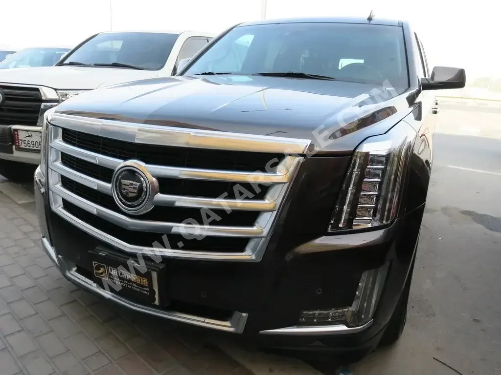 Cadillac  Escalade  2015  Automatic  149,000 Km  8 Cylinder  Four Wheel Drive (4WD)  SUV  Brown