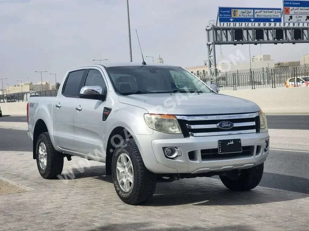  Ford  Ranger  XLT  2015  Manual  35,000 Km  4 Cylinder  Four Wheel Drive (4WD)  Pick Up  Silver  With Warranty