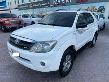  Toyota  Fortuner  SR5  2006  Automatic  342,000 Km  6 Cylinder  Four Wheel Drive (4WD)  SUV  White  With Warranty