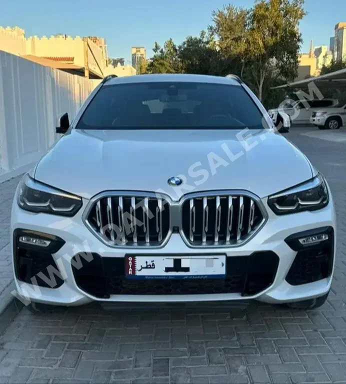 BMW  X-Series  X6  2021  Automatic  29,000 Km  6 Cylinder  Four Wheel Drive (4WD)  SUV  White  With Warranty