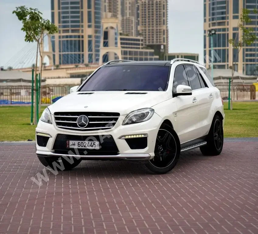 Mercedes-Benz  ML  63 AMG  2015  Automatic  100,000 Km  8 Cylinder  All Wheel Drive (AWD)  SUV  White