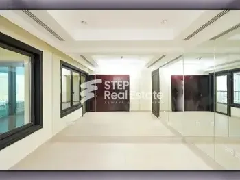 2 Bedrooms  Apartment  For Rent  Doha -  The Pearl  Semi Furnished