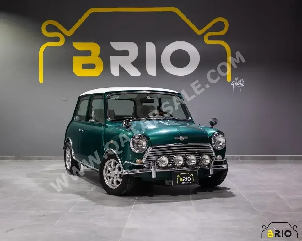 Mini  Cooper  1972  Automatic  33,000 Km  4 Cylinder  Front Wheel Drive (FWD)  Hatchback  Green