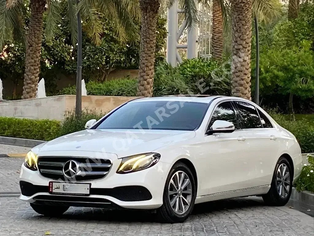 Mercedes-Benz  E-Class  200  2017  Automatic  56,000 Km  4 Cylinder  Rear Wheel Drive (RWD)  Sedan  White